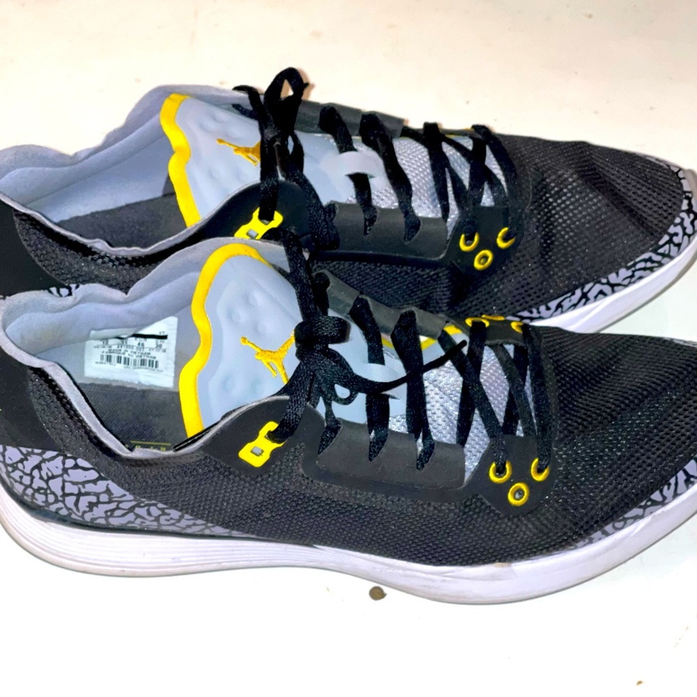 Jordan racer black and gold size 12